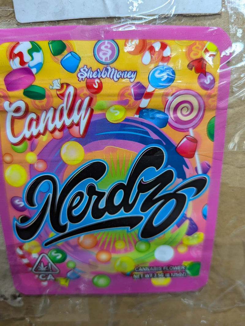 Smell-proof Candy Nerdz bags, 50-pack by The Baggie Store, featuring colorful candy illustrations on sealed, discreet storage pouches.