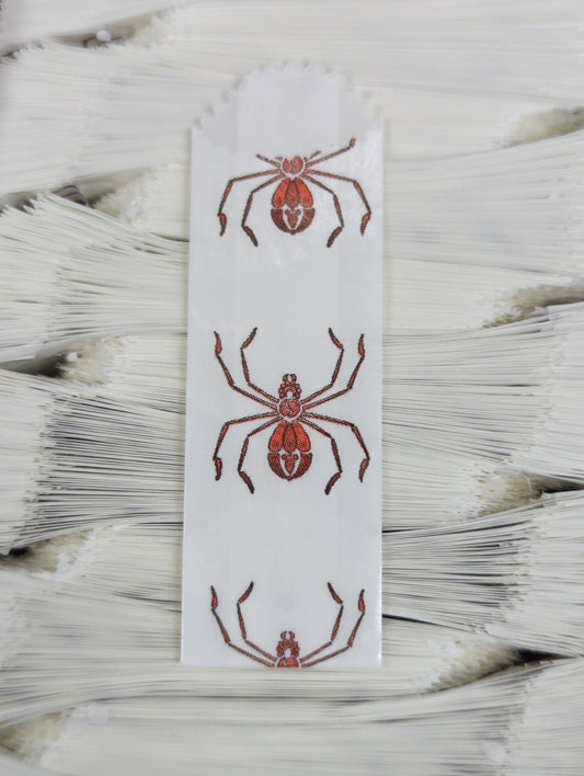 Vellum Glassine Stamp Wax Paper Envelope Bags with spider design, moisture-resistant wax bags for stamp storage.