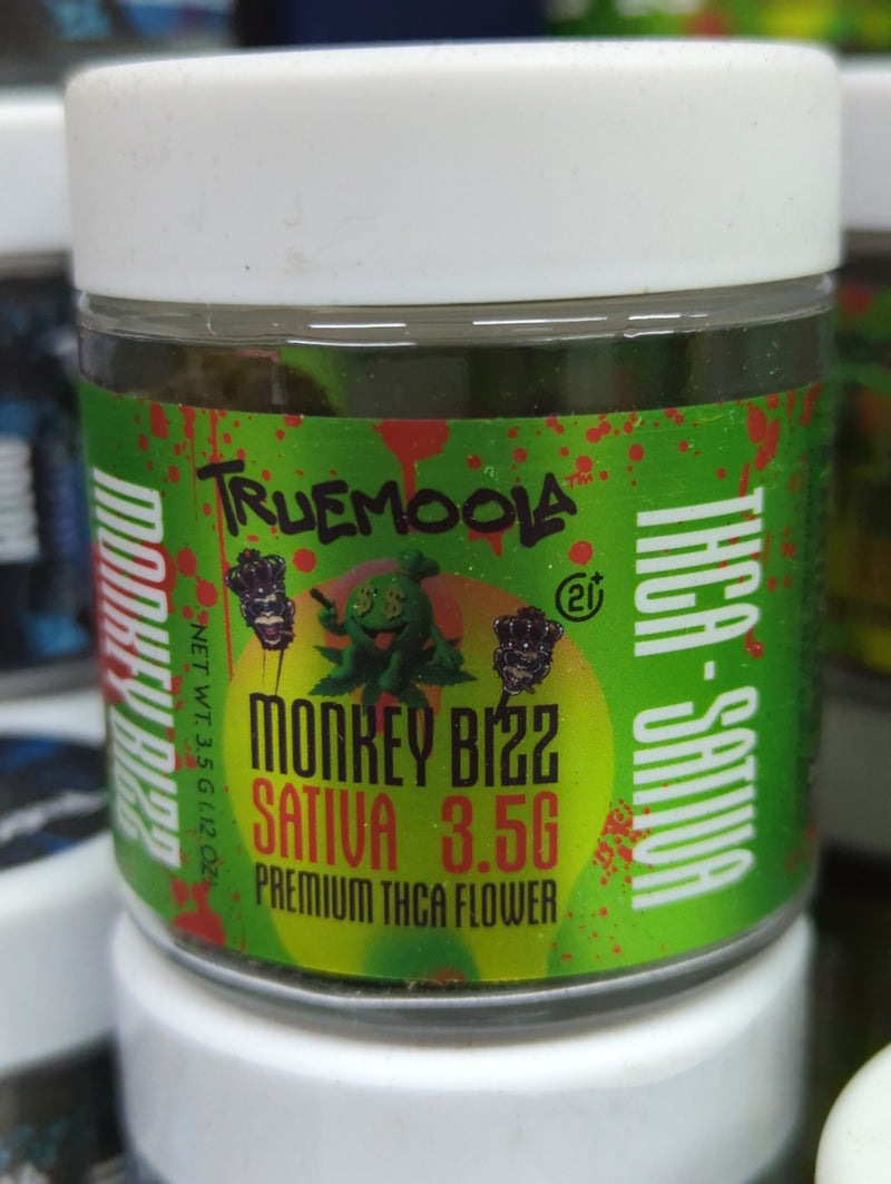 Truemoola Premium Indoor Flower THC-A by The Baggie Store, 3.5g, fresh cannabis buds with vibrant green and orange hairs.
