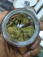 Indoor flower from Muha Meds, 4g, showcasing fresh cannabis buds with vibrant green hues and dense trichome coverage.