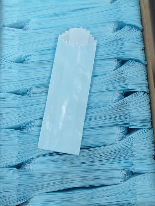 Light blue vellum glassine stamp wax paper envelope bags for collectible stamps, moisture resistant by Stamp Collectors.