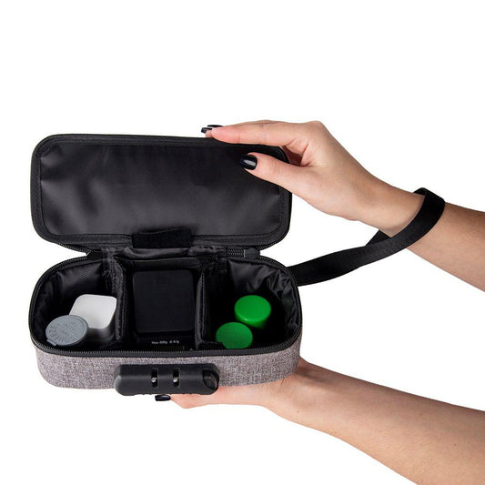 Ooze Traveler smell proof travel pouch in smoke gray, compact and discreet storage for accessories or small items.
