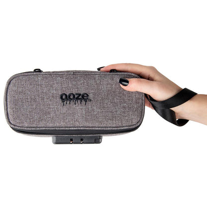 Ooze Traveler Smell Proof Travel Pouch in smoke gray, compact and durable for secure storage of small personal items.