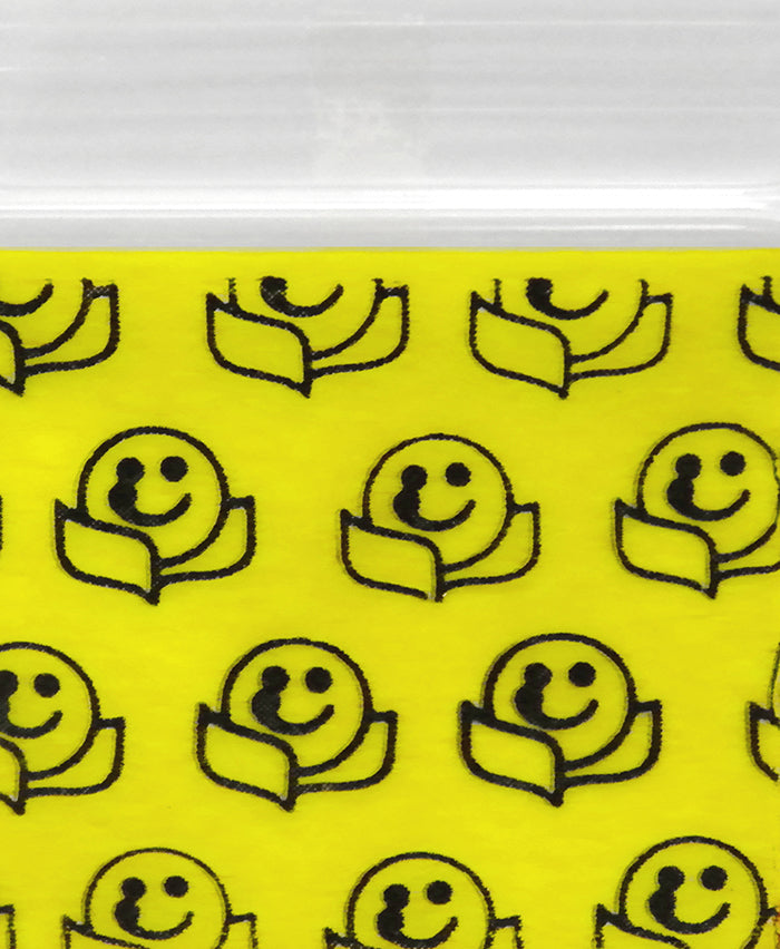 Happy face on a SIZE 1212 Original Apple Bag from The Baggie Store, measuring 1/2" x 1/2" with a cheerful design.
