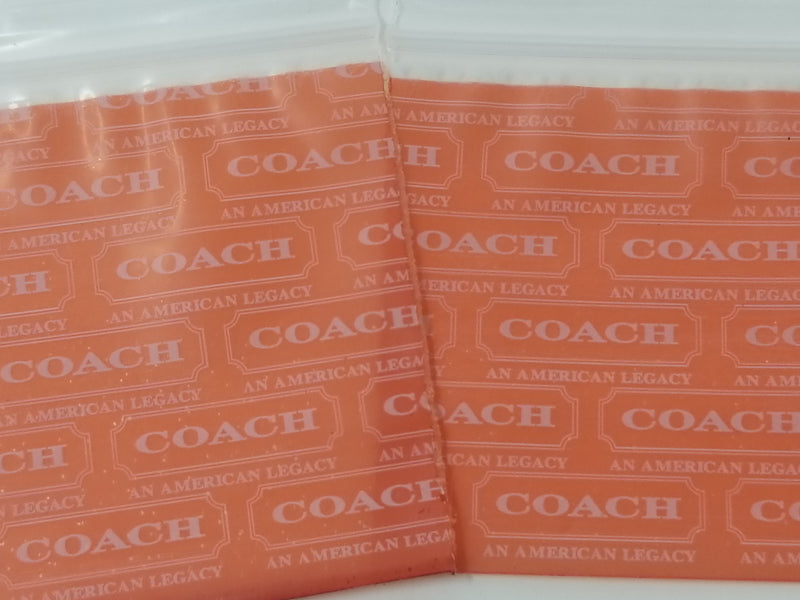 Resealable Original Apple Bags by Coach, transparent plastic storage bags with secure zip closure for organizing items.