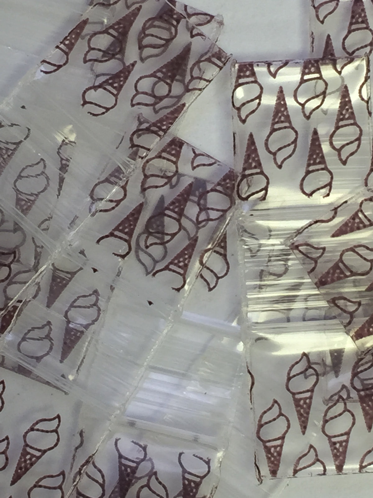 Resealable 1212 Original Apple Bags in ice cream design, 1/2 inch by 1/2 inch, perfect for storing small items or snacks.