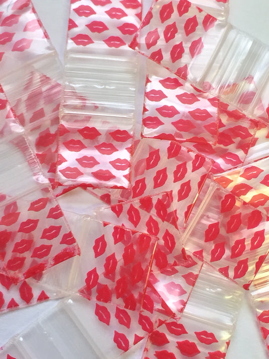 Resealable Original Apple Bags 1/2 inch by 1/2 inch with lips, clear plastic storage bags for small items or packaging.
