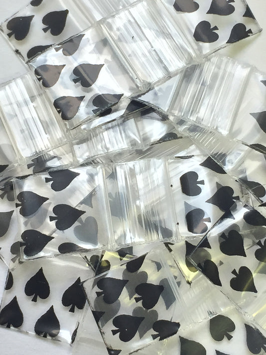 Resealable 1212 Original Apple Bags with spade design, measuring 1/2 inch by 1/2 inch, ideal for storing small items.