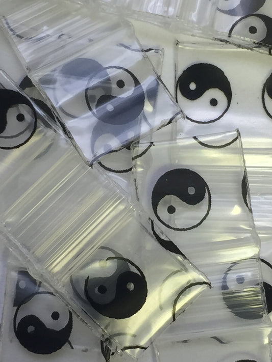 Resealable Original Apple Bags with TaiJi/Yin Yang design, 1/2 inch by 1/2 inch, featuring black and white yin-yang pattern.