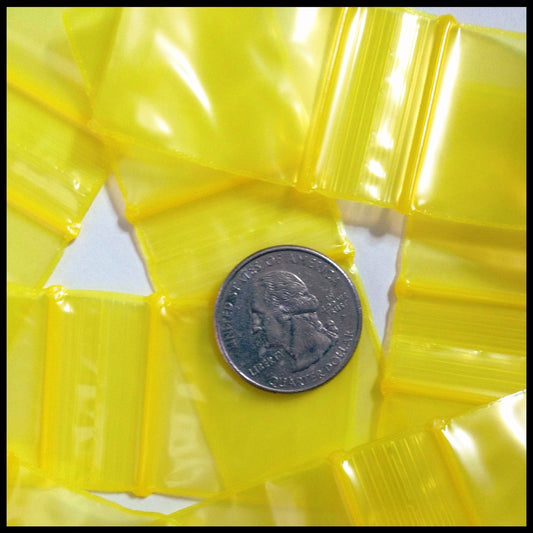 Yellow 1.25x1.25-inch resealable bags from Original Apple Bags, perfect for packaging and storage.