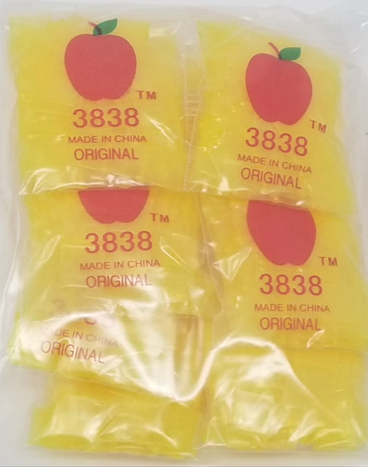Yellow 3/8 inch by 3/8 inch resealable bags from Original Apple Bags, designed for secure storage and packaging.