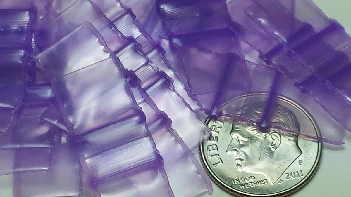 Purple 3/8" x 3/8" resealable bags from Original Apple Bags, flexible plastic storage solution.