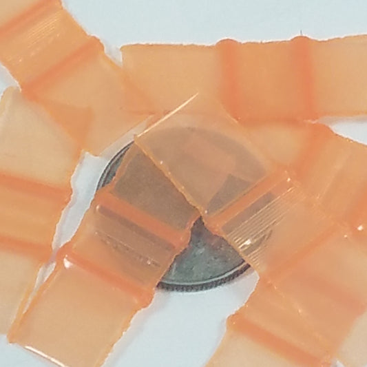 Orange 3/8" x 3/8" resealable bags by Original Apple Bags, made of durable plastic for secure storage and organization.