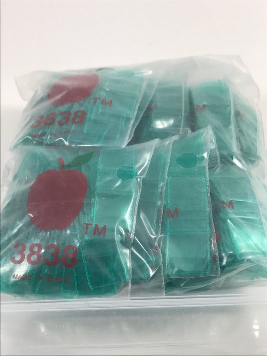Green 3/8 x 3/8-inch resealable Original Apple Bags with a clear, flexible design for secure storage and easy access.