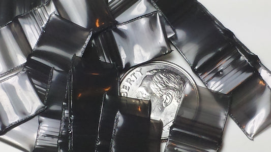 Black 3/8" x 3/8" resealable bags by Original Apple Bags, showcasing their durable, airtight design for secure storage.
