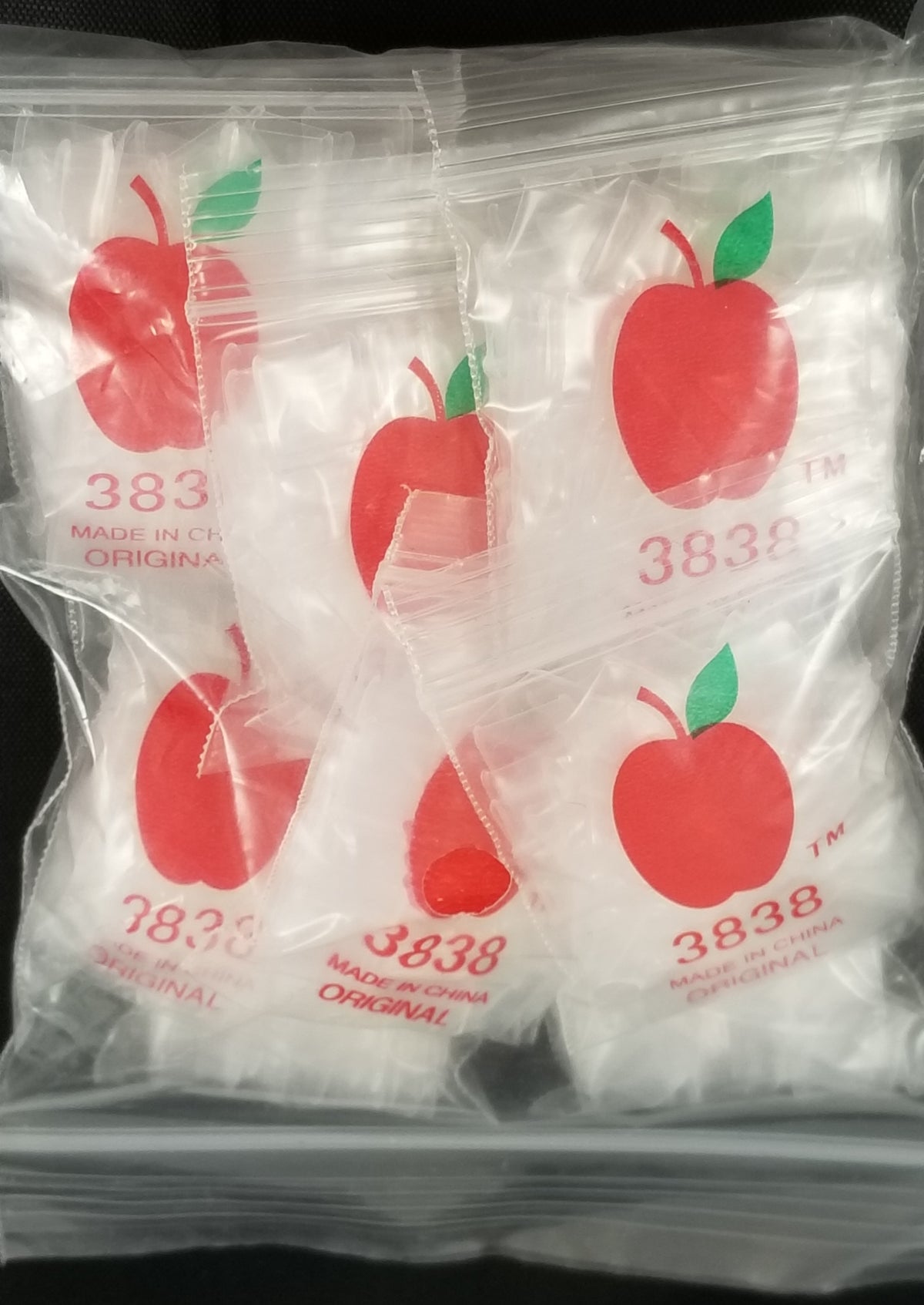 Clear resealable bags from Original Apple Bags, 3/8 inch by 3/8 inch, shown in the image.