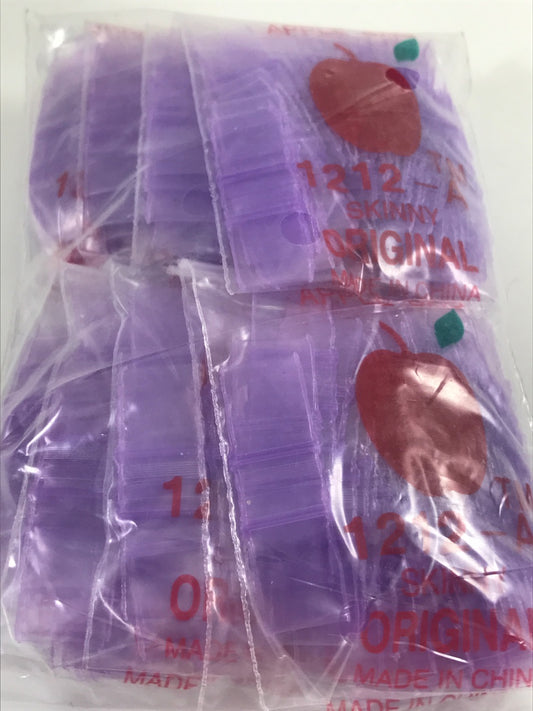 Purple resealable bags by Original Apple Bags, 1/2 inch by 1/2 inch, perfect for storing small items or crafts.