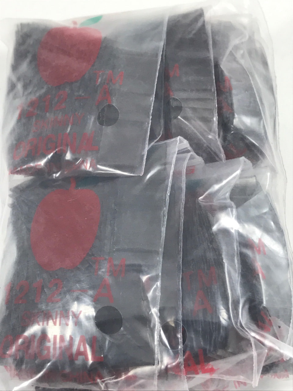 Black resealable Apple Bags 1/2" x 1/2" by Original Apple Bags, showing clear plastic bags with resealable closures.