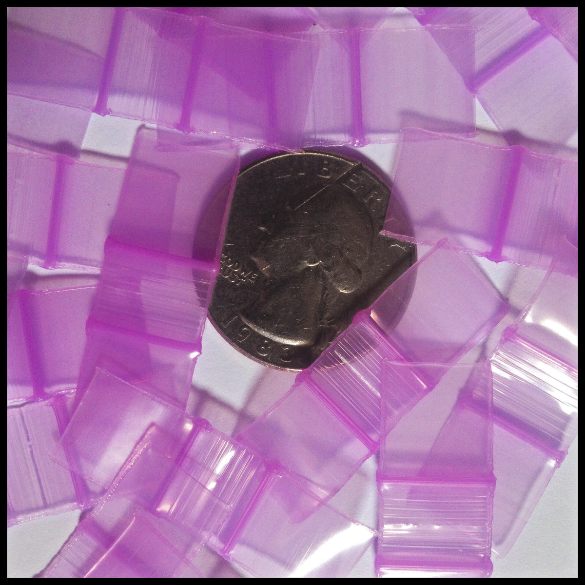 Purple Original Apple Bags resealable bags, 1/2 inch by 1/2 inch, designed for secure storage and packaging.