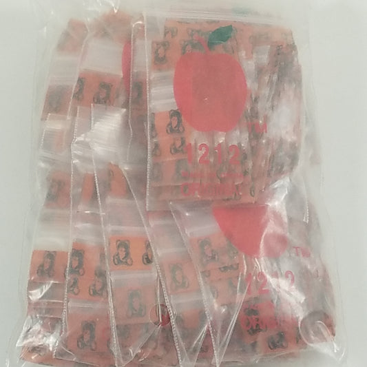 Resealable 1212 Original Apple Bags with teddy bear design, 1/2 inch by 1/2 inch, ideal for small items and packaging.