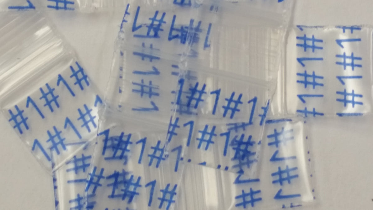 Resealable 1212 Original Apple Bags, 1/2 inch by 1/2 inch, designed for secure storage and organization.