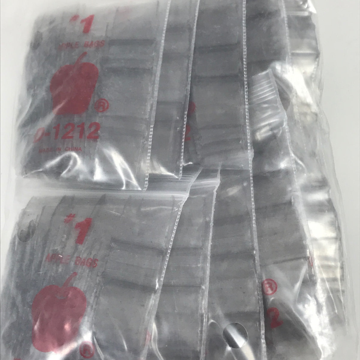 Silver 1/2 x 1/2-inch resealable Original Apple Bags for storing small items or jewelry.