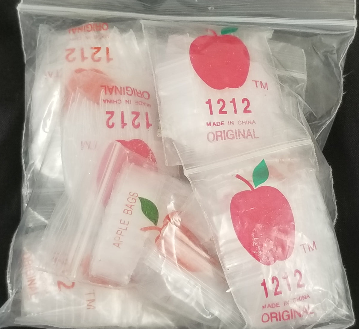 Clear 1/2 x 1/2-inch resealable apple bags by Original Apple Bags, showing transparent plastic bags with resealable tops.