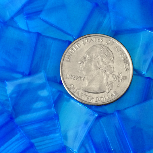 Blue 5/8" x 5/8" resealable bags from Original Apple Bags, made for secure storage and packaging.