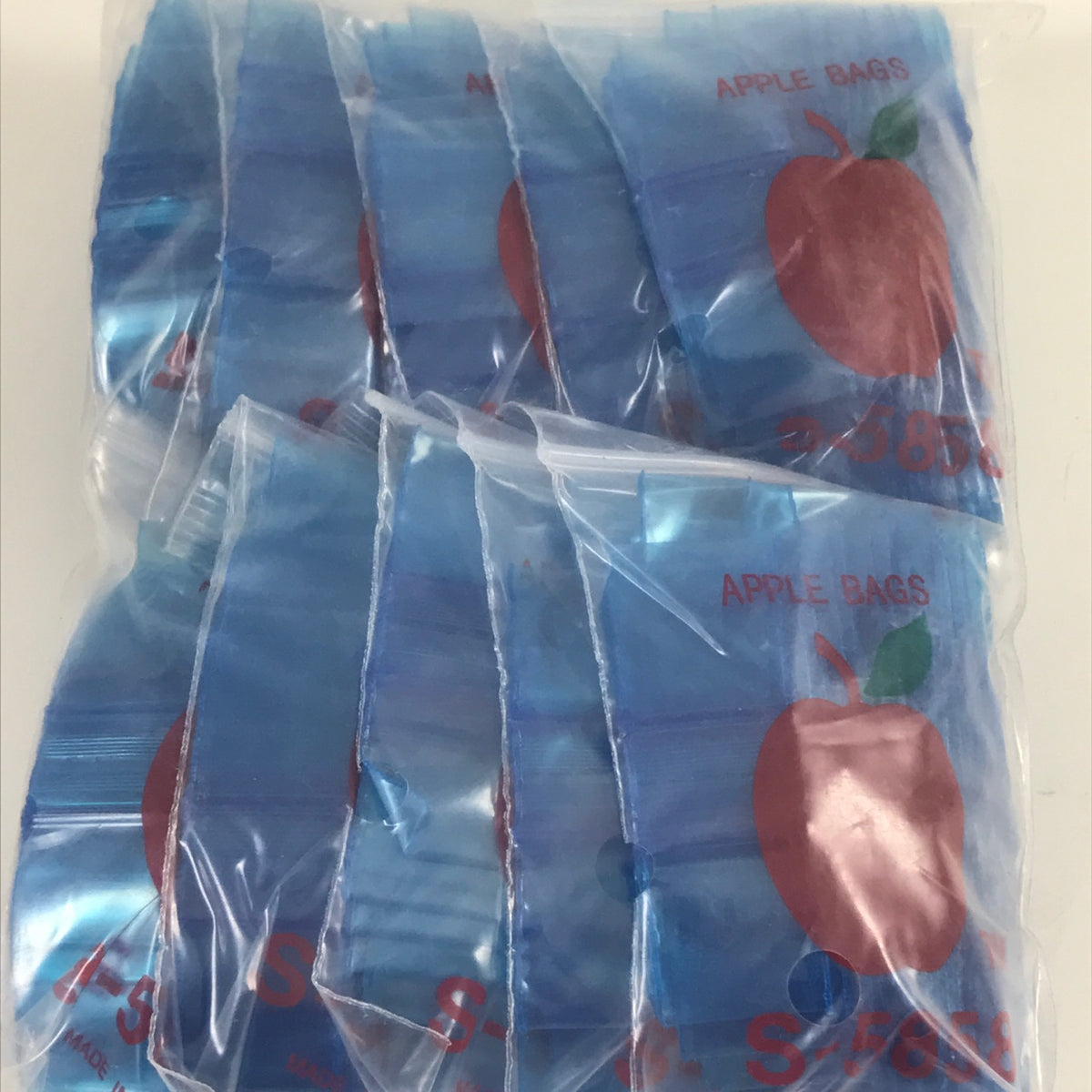 Blue resealable bags from Original Apple Bags, 5/8 inch by 5/8 inch size, perfect for storing small items.