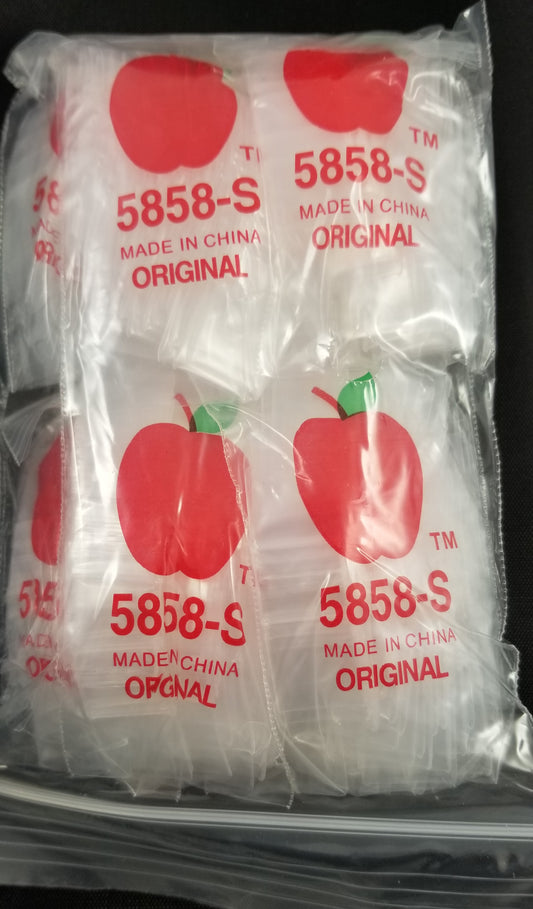 Clear resealable plastic bags from Original Apple Bags, 5/8 inch by 5/8 inch, suitable for small items or packaging.