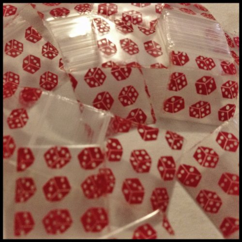 Red dice design resealable bags from Original Apple Bags, measuring 5/8" x 5/8" for small storage or packaging.