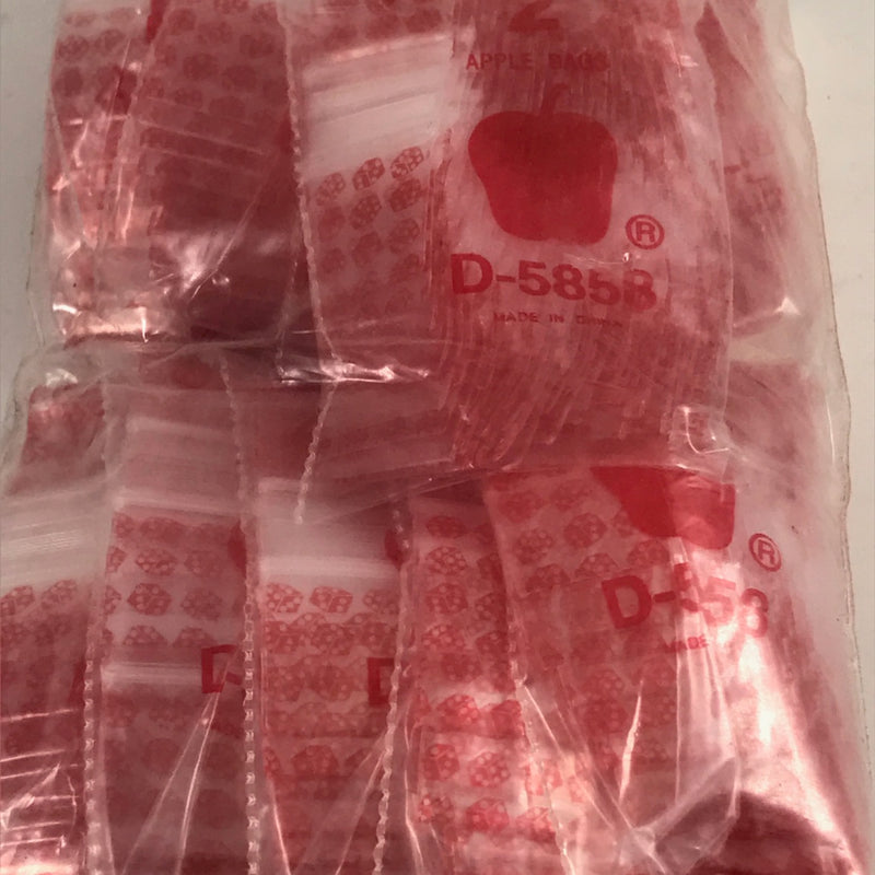 Red dice design resealable bags from Original Apple Bags, 5/8 inch by 5/8 inch size, ideal for storage and organization.
