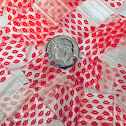 Resealable Original Apple Bags 5/8 x 5/8 inches with lips, ideal for storing small items or food packaging.