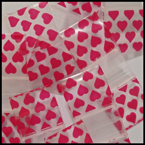 Resealable 5/8" x 5/8" Original Apple Bags with heart design, ideal for packaging small items or gifts.