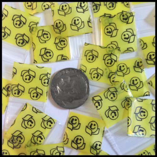 Original Apple Bags 5858 resealable bags with happy face design, 5/8 inch by 5/8 inch, for storage and packaging.