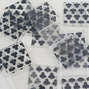 Original Apple Bags resealable bags with 5/8-inch by 5/8-inch club pattern, ideal for storing small items or crafts.