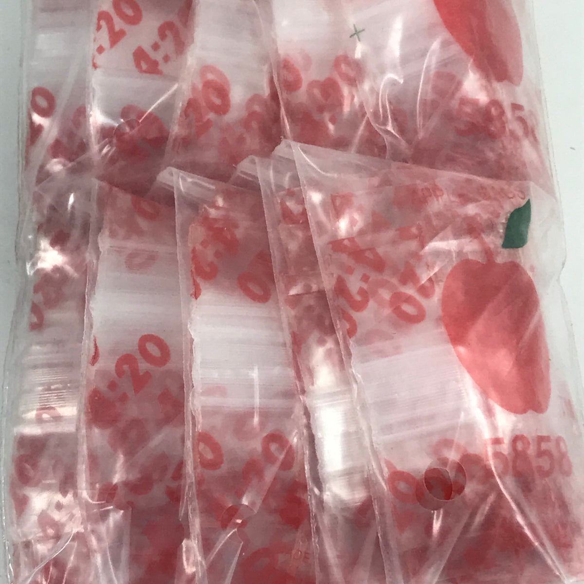 Original Apple Bags resealable bags, 5/8" x 5/8" size, shown in the image with clear plastic material and resealable closure