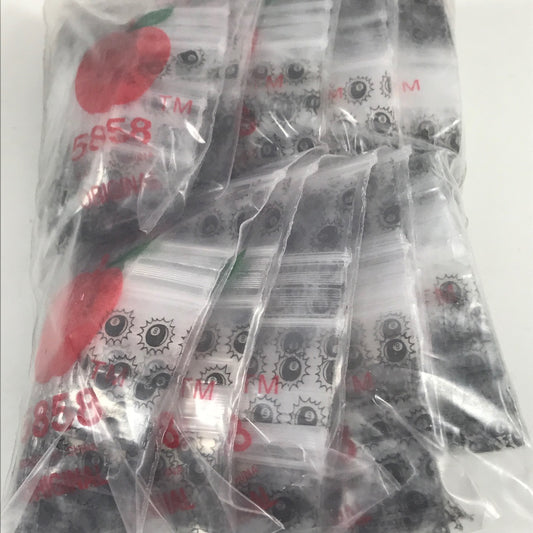 Resealable Original Apple Bags 5/8" x 5/8" with Eight Ball design, ideal for storing small items or collectibles.