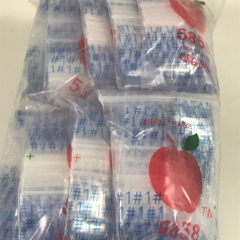 Resealable 5/8-inch by 5/8-inch Original Apple Bags in clear plastic for secure storage and organization.