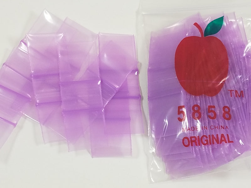 Purple 5858 Original Apple Bags resealable bags, 5/8 inch by 5/8 inch, made for secure storage and packaging.