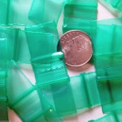 Green 5/8" x 5/8" resealable bags by Original Apple Bags, perfect for storing small items securely.