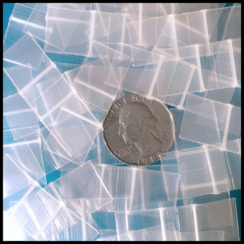 Clear resealable bags from Original Apple Bags, 5/8 inch by 5/8 inch, perfect for storing small items.