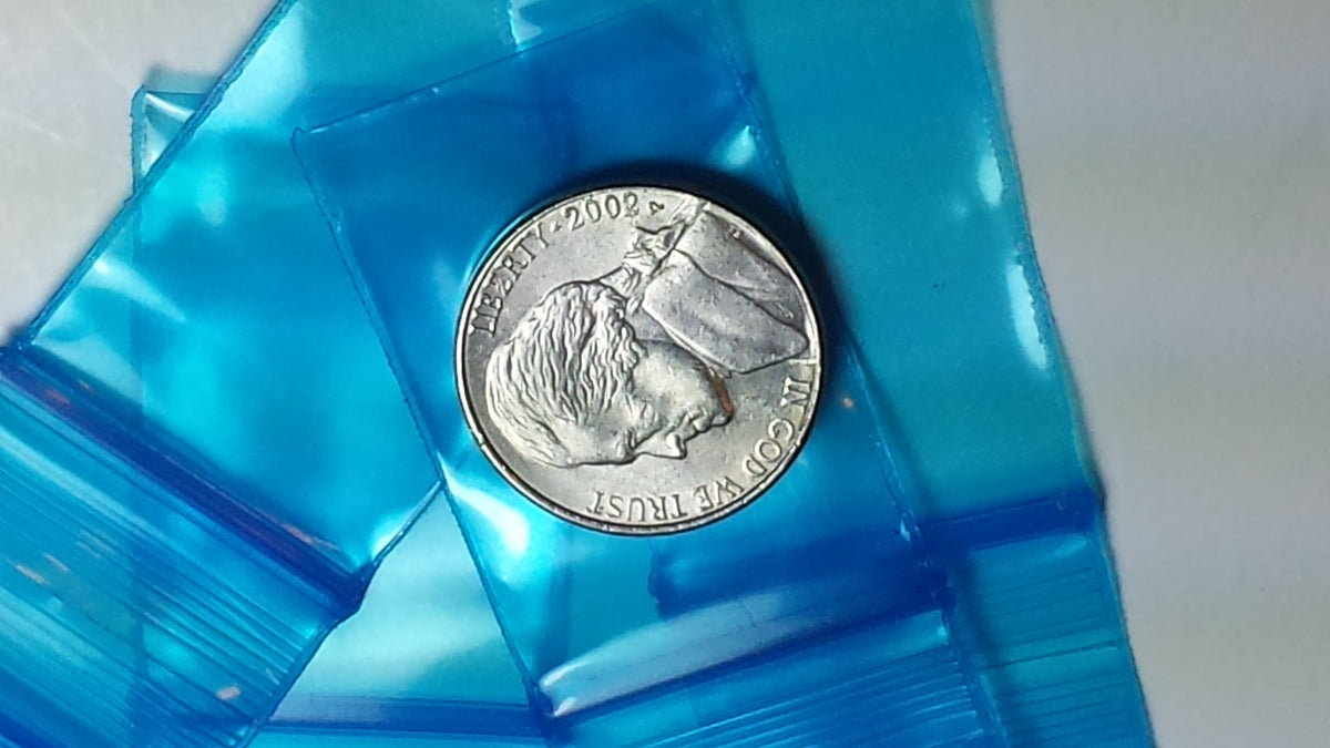 Blue 1x1.5-inch resealable bags from Original Apple Bags, ideal for storage and organization.