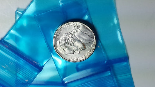 Blue 1x1.5-inch resealable bags from Original Apple Bags, ideal for storage and organization.