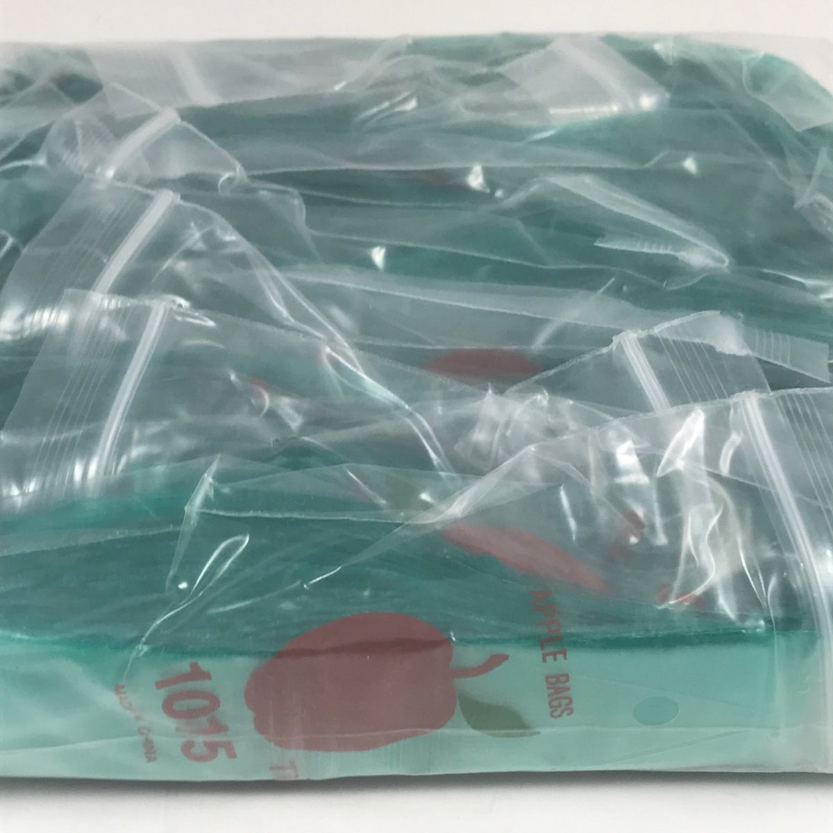 Green 1x1.5-inch Original Apple Bags resealable bags, perfect for packaging or storage.
