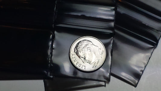 Black resealable Apple Bags with 1.25"x1" size, featuring the Original Apple Bags branding and clear plastic material.