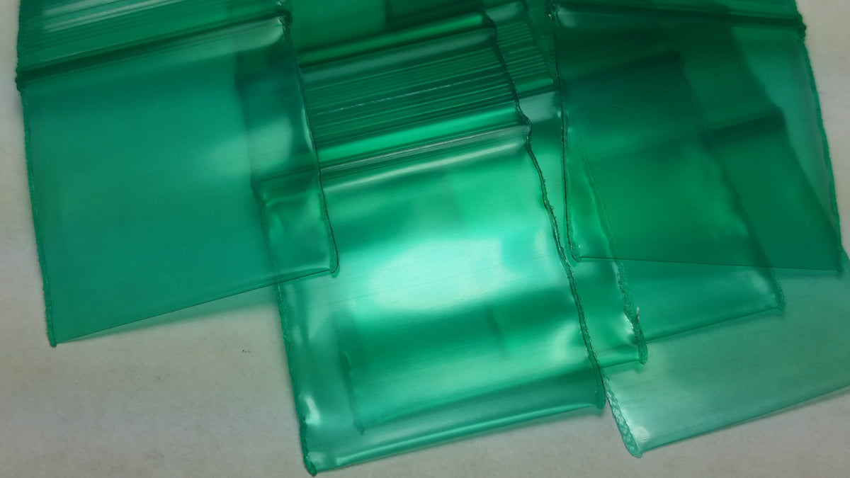 Green resealable bags from Original Apple Bags, 1.25 x 1.25 inches, ideal for storage and organization.