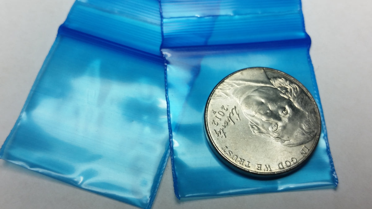 Blue resealable bags from Original Apple Bags, 1.25x1.25 inches, ideal for packaging or storage.