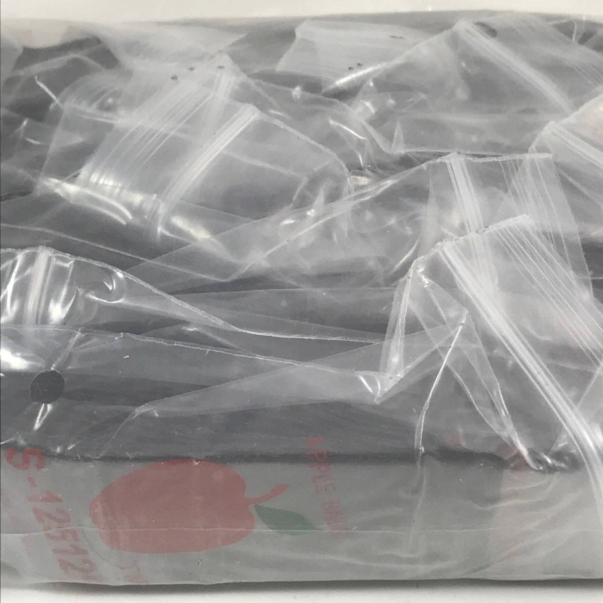 Black resealable Apple Bags with 1.25-inch square design, made by Original Apple Bags for secure storage.