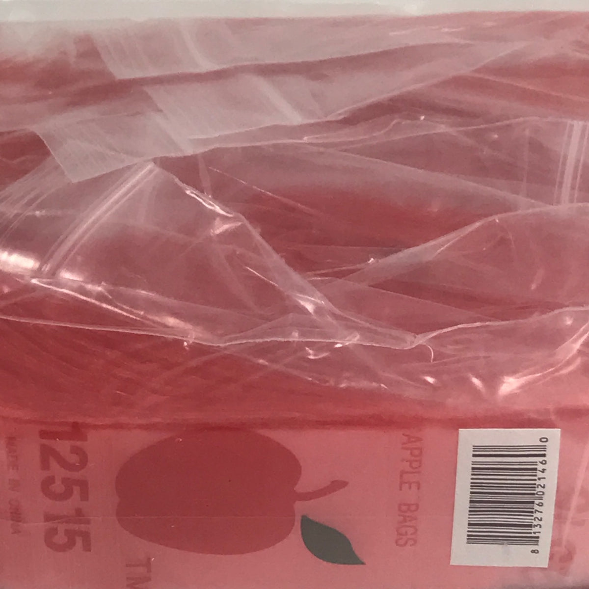 Red resealable Apple Bags, original brand 1.25" x 1.5" size, shown with clear opening and secure seal.